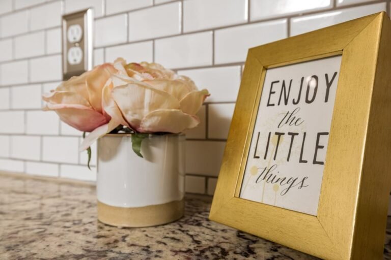 A visual schedule chart with picture cards hanging on a kitchen wall