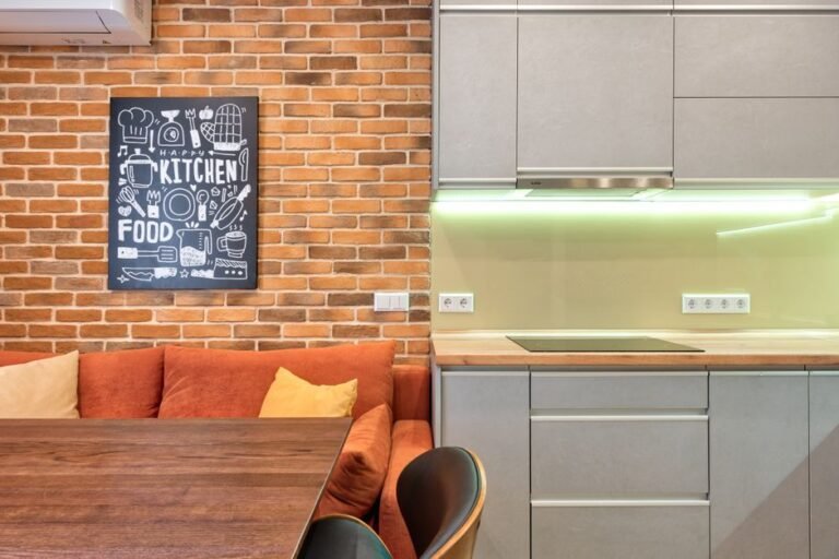 A picture-based visual schedule chart hanging on a kitchen wall