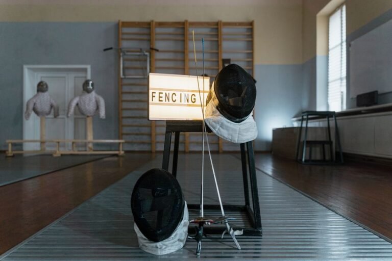 A school room with floor cushions, soft lighting, and a small swing hanging in one corner